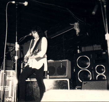 Onstage, tight pants, make-up